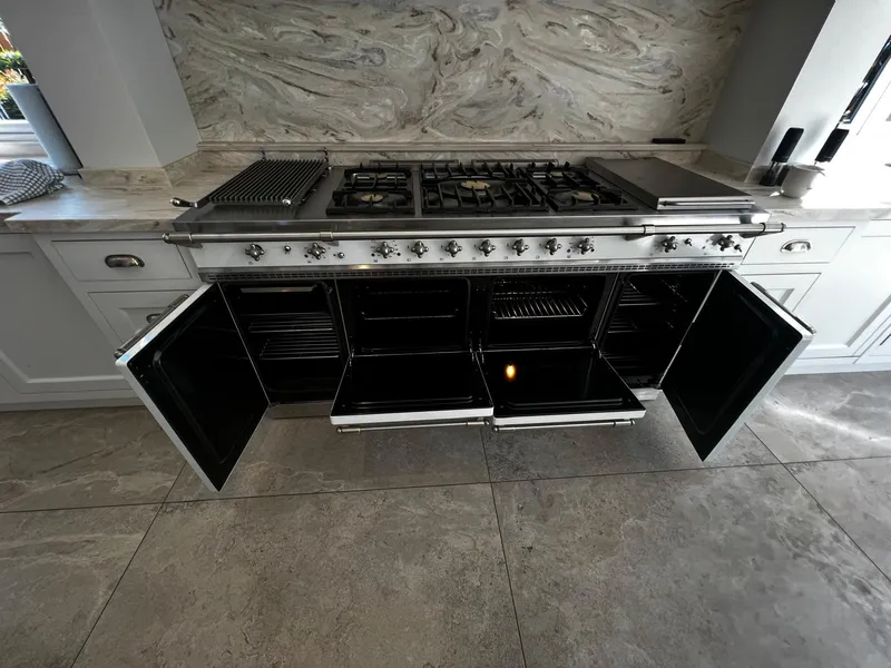 Range cooker with every door open after a deep clean
