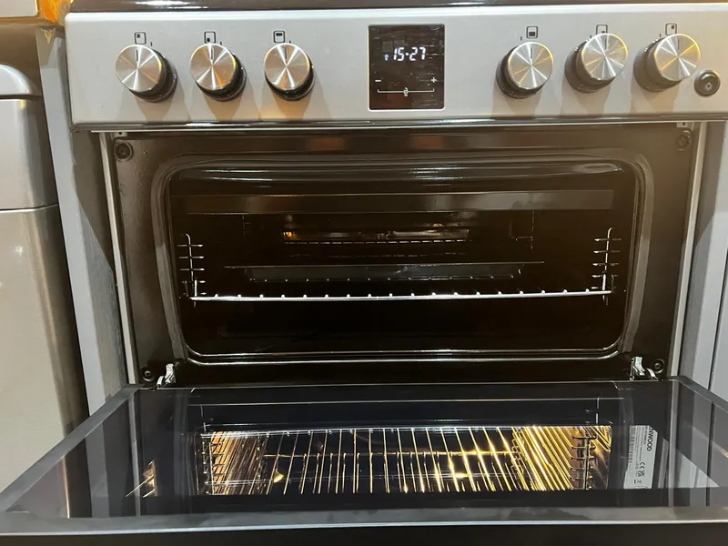 Double oven with the door open after cleaning